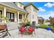 Back patio with comfortable seating and stylish decor, ideal for relaxing and entertaining outdoors at 1581 S 825 E, Zionsville, IN 46077