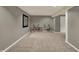 Unfinished basement featuring neutral carpet, recessed lights, and three bicycles at 15890 Concert Way, Noblesville, IN 46060