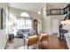 Spacious living room features hardwood floors, high ceilings, and large windows at 15890 Concert Way, Noblesville, IN 46060