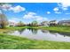 Scenic pond in a peaceful neighborhood offering serene views and a connection with nature at 15890 Concert Way, Noblesville, IN 46060