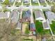 Aerial view of home with well-maintained backyard, detached garage, and neat landscaping at 1646 Fisher Ave, Indianapolis, IN 46224
