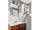 Charming bathroom with vintage-style sink, subway tile, and modern lighting fixtures at 1646 Fisher Ave, Indianapolis, IN 46224