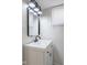View of the bathroom sink, vanity and modern lighting fixture at 1646 Fisher Ave, Indianapolis, IN 46224