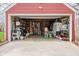 Open garage displaying the ample storage space available for tools and projects at 1646 Fisher Ave, Indianapolis, IN 46224