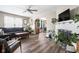 Spacious living room with hardwood floors, a fireplace, and an open layout perfect for entertaining at 1646 Fisher Ave, Indianapolis, IN 46224