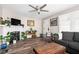 Bright living room featuring a fireplace, hardwood floors, and ample seating for guests at 1646 Fisher Ave, Indianapolis, IN 46224