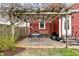 Charming patio with pergola, swing, table and chairs, perfect for enjoying the outdoors at 1646 Fisher Ave, Indianapolis, IN 46224