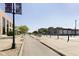 A sunny day on the street reveals a welcoming neighborhood and well-maintained sidewalks at 1646 Fisher Ave, Indianapolis, IN 46224