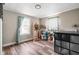 Well-lit studio featuring hardwood floors, natural light, art supplies, and a creative atmosphere at 1646 Fisher Ave, Indianapolis, IN 46224