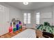 Bedroom with a foosball table and shelves of toys at 1707 Lafayette Ave, Lebanon, IN 46052