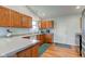 Well-equipped kitchen featuring granite countertops, stainless steel appliances, and wood cabinets at 1707 Lafayette Ave, Lebanon, IN 46052