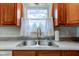 Close up of kitchen sink with window view at 1707 Lafayette Ave, Lebanon, IN 46052