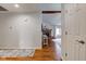 Open living room with hardwood floors, fireplace, and view of the backyard at 1707 Lafayette Ave, Lebanon, IN 46052