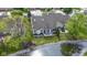 A beautiful view of the backyard with a pond, and a patio with outdoor furniture at 17777 Crown Pointe Ct, Noblesville, IN 46062