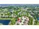 Aerial view of the property and surrounding community featuring golf course and ponds at 17777 Crown Pointe Ct, Noblesville, IN 46062