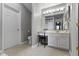 Bathroom with vanity, chair and toilet in a well lit area at 17777 Crown Pointe Ct, Noblesville, IN 46062