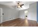 Bright bedroom with hardwood floors, ceiling fan and neutral tones at 17777 Crown Pointe Ct, Noblesville, IN 46062