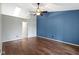 Open bedroom with hardwood floors, ceiling fan and neutral tones at 17777 Crown Pointe Ct, Noblesville, IN 46062
