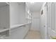 Bright walk-in closet featuring custom shelving and hanging rods at 17777 Crown Pointe Ct, Noblesville, IN 46062