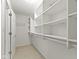 Spacious walk-in closet with built-in shelving and ample storage at 17777 Crown Pointe Ct, Noblesville, IN 46062