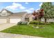Charming brick home with a two-car garage and well-manicured lawn at 17777 Crown Pointe Ct, Noblesville, IN 46062