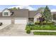 Beautiful brick home with attached garage and a well-maintained lawn and landscaping at 17777 Crown Pointe Ct, Noblesville, IN 46062