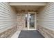 Inviting front porch featuring brick accents, a screen door, and a tiled floor at 17777 Crown Pointe Ct, Noblesville, IN 46062