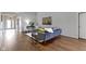 Comfortable living room with hardwood floors and vaulted ceiling, showcasing modern decor at 17777 Crown Pointe Ct, Noblesville, IN 46062