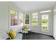 Bright sunroom filled with natural light and comfortable seating at 17777 Crown Pointe Ct, Noblesville, IN 46062