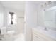 Bright bathroom featuring modern fixtures, a shower, toilet, and vanity at 1911 N Rangeline Rd, Anderson, IN 46012