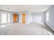 Bright and open bedroom with white trim, new flooring, and lots of natural light at 1911 N Rangeline Rd, Anderson, IN 46012