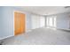 Bright bedroom with gray walls, new flooring, and lots of closet space at 1911 N Rangeline Rd, Anderson, IN 46012