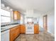 Bright kitchen featuring wood cabinets, modern appliances, and lots of natural light at 1911 N Rangeline Rd, Anderson, IN 46012