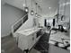 Modern kitchen with a waterfall island, stainless steel appliances, and pendant lighting at 2232 Central Ave, Indianapolis, IN 46205