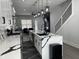 Modern kitchen with a large island, stainless steel appliances, and pendant lighting at 2232 Central Ave, Indianapolis, IN 46205