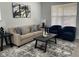 Living room with a couch, chairs, coffee table, and side tables at 2232 Central Ave, Indianapolis, IN 46205