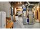 Unfinished basement space with a heater, concrete walls, and open framing at 2507 Silver Oaks Dr, Carmel, IN 46032