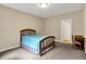 This bedroom features soft carpet, light-filled rooms, and a classic wood bed at 2507 Silver Oaks Dr, Carmel, IN 46032