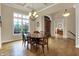 Elegant dining room with hardwood floors, large window, and coffered ceilings at 2507 Silver Oaks Dr, Carmel, IN 46032