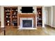 Living room with a fireplace and built-in bookshelves at 2507 Silver Oaks Dr, Carmel, IN 46032