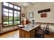 Home office with hardwood floors, large window, and ample natural light at 2507 Silver Oaks Dr, Carmel, IN 46032