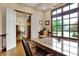 Office space with hardwood floors, a large window, and a stylish desk at 2507 Silver Oaks Dr, Carmel, IN 46032