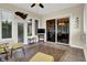 Bright sunroom featuring tile floor, multiple windows and views of the backyard at 2507 Silver Oaks Dr, Carmel, IN 46032