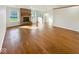 Bright living room with hardwood floors, brick fireplace, and lots of natural light at 2623 Kirk Ct, Lebanon, IN 46052