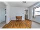 Cozy dining area featuring hardwood floors, classic furniture, and ample natural light at 2735 S Taft Ave, Indianapolis, IN 46241
