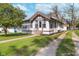 Quaint home with a traditional design, showcasing a well-kept lawn and inviting front entrance at 2735 S Taft Ave, Indianapolis, IN 46241