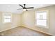 Cozy bedroom with plush carpeting, neutral walls, and plenty of natural light at 2926 Indianapolis Ave, Indianapolis, IN 46208