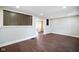 Spacious living room with hardwood floors, neutral walls, and modern accents at 2926 Indianapolis Ave, Indianapolis, IN 46208