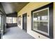 Relaxing screened porch with painted trim and a view of the neighborhood at 2926 Indianapolis Ave, Indianapolis, IN 46208