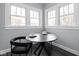 Cozy breakfast nook with modern table, stylish chairs, and bright natural light at 310 W 43Rd St, Indianapolis, IN 46208